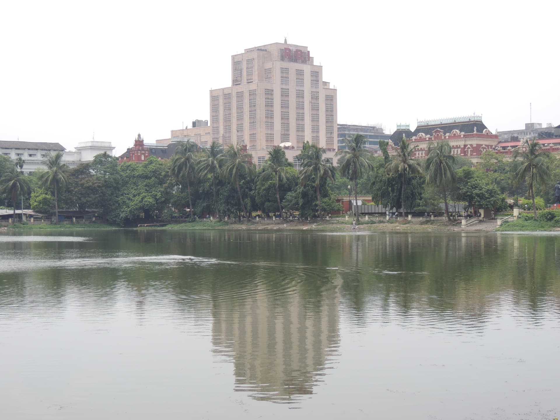 Lal Dighi and the City Skyline · লালদিঘি ও শহরের ভবনগুলি, Kolkata, West Bengal, India